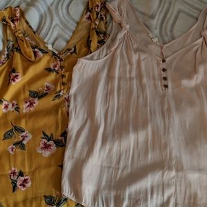 Two silky sleeveless tops